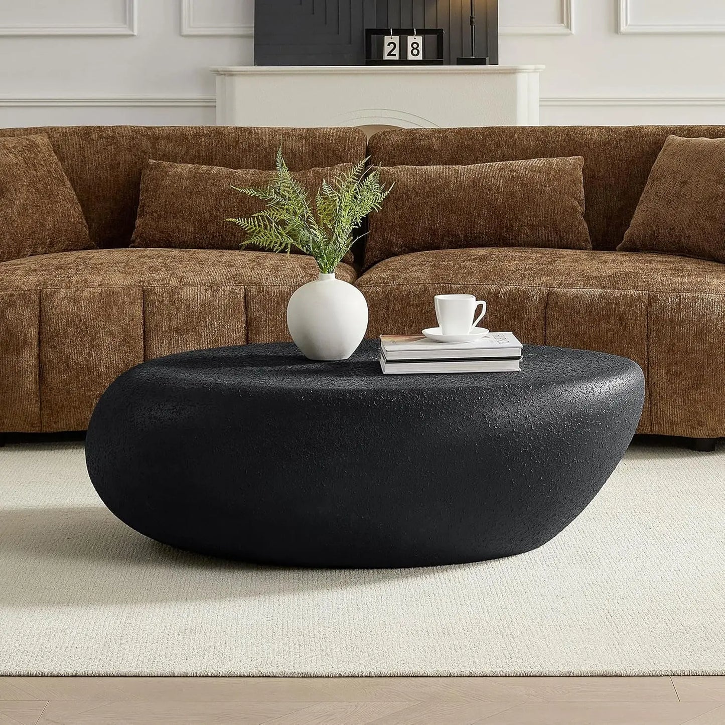 Oval Faux Stone Coffee Table With Minimalist Fiberglass Frame