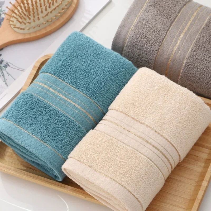 Premium Absorbent Cotton Towels With Elegant Gold Trim